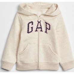 Bluza w kolorze jasnoszarym. Szare bluzy niemowlęce Gap Kids, z aplikacjami, bez rękawów, bez kaptura. W wyprzedaży za 75,95 zł.