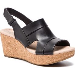 Sandały CLARKS - Annadel Ivory 261399544 Black Leather. Czarne klapki damskie Clarks, bez wzorów, ze skóry, bez obcasa, na obcasie. W wyprzedaży za 209,00 zł.