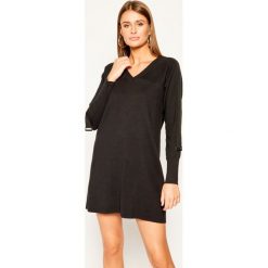 Sukienka dzianinowa Pennyblack Oblungo 33245019. Niebieskie sukienki damskie Pennyblack, l, bez wzorów, z dzianiny, bez kołnierzyka, bez rękawów. W wyprzedaży za 359,00 zł.