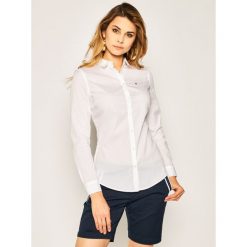 Koszula Tommy Jeans DW0DW04432. Białe bluzki damskie Tommy Jeans, xl, bez wzorów, z elastanu, bez kołnierzyka, bez rękawów. W wyprzedaży za 219,00 zł.