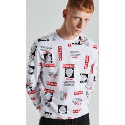 Bluza z nadrukiem all over Rick and Morty - Biały. Białe bluzy męskie Cropp, s, z nadrukiem, bez kołnierzyka, bez rękawów, bez kaptura. W wyprzedaży za 49,99 zł.