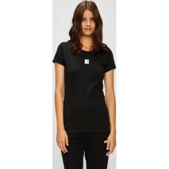 The North Face - Top. Czarne topy damskie marki The North Face, s, z bawełny, z okrągłym kołnierzem. W wyprzedaży za 89,90 zł.