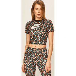 Nike Sportswear - T-shirt. Czarne topy damskie Nike Sportswear, s, z nadrukiem, z poliesteru, z krótkim rękawem. Za 149,90 zł.