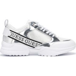 Guess Tenisówki Biały Srebrny. Szare trampki i tenisówki damskie Guess, z aplikacjami, z materiału. Za 516,95 zł.