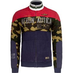 Bluza AERONAUTICA MILITARE. Niebieskie bluzy męskie Aeronautica Militare, z napisami, militarne, ze stójką, bez rękawów, bez kaptura. W wyprzedaży za 418,00 zł.