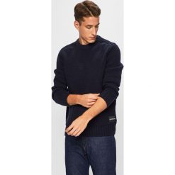 Calvin Klein Jeans - Sweter. Niebieskie swetry męskie Calvin Klein Jeans, xl, bez wzorów, z wełny, z okrągłym kołnierzem, bez kaptura. W wyprzedaży za 299,90 zł.