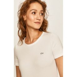 Lacoste - T-shirt. Niebieskie bluzki damskie Lacoste, s, bez wzorów, z elastanu, z okrągłym kołnierzem. W wyprzedaży za 129,90 zł.