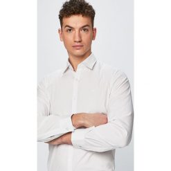 Lacoste - Koszula. Białe koszule męskie marki Lacoste, s, bez wzorów, z elastanu, eleganckie, z klasycznym kołnierzykiem, z długim rękawem. Za 499,90 zł.