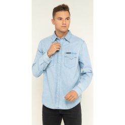 Koszula Calvin Klein Jeans J30J313795. Niebieskie koszule męskie Calvin Klein Jeans, xl, bez wzorów, z bawełny, casualowe, bez kołnierzyka, bez rękawów. W wyprzedaży za 189,00 zł.