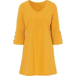 Cellbes Tunika ciemnożółty female żółty 38/40. Żółte tuniki damskie Cellbes, bez wzorów, z dżerseju, eleganckie, z dekoltem w serek, bez rękawów. Za 159,00 zł.
