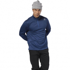 Bluza do biegania męska REEBOK US DOUBLE KNIT 1/4 BUNBLU / DH1934. Niebieskie bluzy męskie Reebok, m. Za 169,00 zł.
