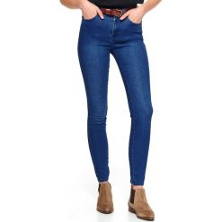 Damskie jeansowe spodnie skinny. Niebieskie spodnie damskie Top Secret, na zimę, s, bez wzorów, z jeansu. W wyprzedaży za 49,99 zł.
