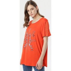 Pomarańczowa Bluzka Meryl. Pomarańczowe bluzki damskie Born2be, s, z aplikacjami, z okrągłym kołnierzem, z krótkim rękawem. Za 59,99 zł.
