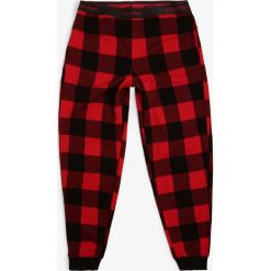 Calvin Klein - Damskie spodnie dresowe, czerwony. Czerwone spodnie damskie s, z dresówki, klasyczne. Za 199,95 zł.