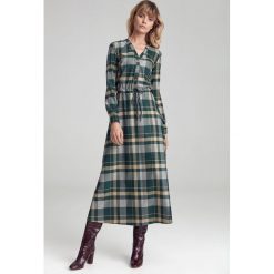 Sukienka maxi w kratę elegancka - 38. Sukienki damskie e-margeritka.pl, do pracy, uniwersalny, bez wzorów, z poliesteru, eleganckie, bez kołnierzyka, z długim rękawem, długie, mini, dopasowane. Za 199,99 zł.