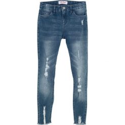 Dżinsy dziewczęce SKINNY z efektem "used" bonprix niebieski "medium bleached". Niebieskie spodnie dziewczęce bonprix, bez wzorów, z elastanu, eleganckie. Za 84,99 zł.