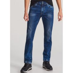 Spodnie jeansowe slim - Granatowy. Niebieskie spodnie męskie Reserved, m, bez wzorów, z jeansu. Za 129,99 zł.