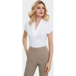 Elegancki top. Bluzki damskie Greenpoint, bez wzorów, z elastanu, bez kołnierzyka. Za 59,99 zł.