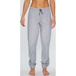 Tommy Hilfiger - Spodnie piżamowe. Niebieskie piżamy damskie TOMMY HILFIGER, s, bez wzorów, z bawełny, bez rękawów. W wyprzedaży za 149,90 zł.