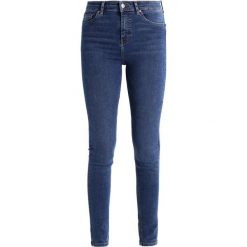 Topshop Tall JAMIE Jeans Skinny Fit middenim. Niebieskie rurki damskie marki Topshop Tall. W wyprzedaży za 239,20 zł.
