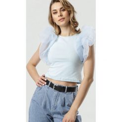 Jasnoniebieska Bluzka Kynan. Niebieskie bluzki damskie Born2be, s, bez wzorów, bez kołnierzyka, bez rękawów. W wyprzedaży za 44,99 zł.