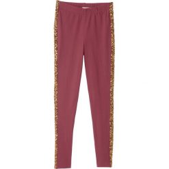 Legginsy z cekinami bonprix bordowy. Czerwone spodnie dziewczęce bonprix, bez wzorów. Za 24,99 zł.