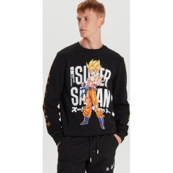 Bluza Dragon Ball - Czarny. Czarne bluzy męskie Cropp, s, bez wzorów, bez kołnierzyka, bez rękawów, bez kaptura. Za 99,99 zł.
