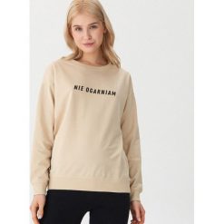 Bluza z napisem - Kremowy. Białe bluzy damskie House, s, z napisami, bez rękawów, bez kaptura. Za 49,99 zł.
