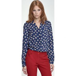 Bluzka z wycięciami - dynie. Bluzki damskie NIFE, xl, bez wzorów, z poliesteru, eleganckie, z klasycznym kołnierzykiem, bez rękawów. Za 139,00 zł.