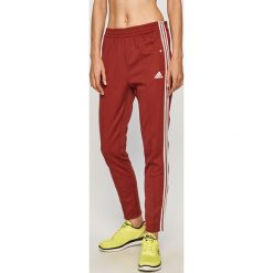 Adidas Performance - Spodnie. Czerwone spodnie dresowe damskie adidas Performance, s, z bawełny. Za 229,90 zł.