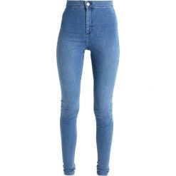 Topshop Tall JONI Jeans Skinny Fit middenim. Niebieskie rurki damskie marki Topshop Tall. Za 209,00 zł.