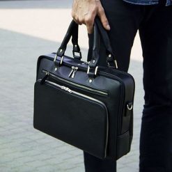 Skórzana męska torba na laptopa Solier SL24 Shannon czarna - Czarny. Czarne torby męskie skórzane Solier, ze skóry. Za 559,99 zł.