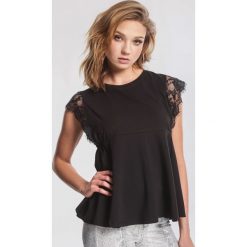 Czarna Bluzka Hit Bottom. Czarne bluzki damskie marki other, xl, w paski, z dzianiny, z okrągłym kołnierzem, z krótkim rękawem. Za 59,99 zł.