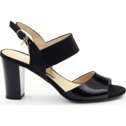 Czarne Caprice sandały buty damskie 28307. Czarne sandały damskie Caprice, w paski, ze skóry, bez obcasa, z paskami. W wyprzedaży za 147,95 zł.