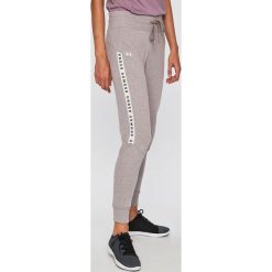 Under Armour - Spodnie. Szare spodnie damskie Under Armour, s, bez wzorów, z poliesteru. W wyprzedaży za 159,90 zł.