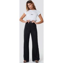 XLE the Label Spodnie Meredith Palazzo - Black. Czarne spodnie damskie z wysokim stanem marki XLE the Label, z podwyższonym stanem. Za 200,95 zł.