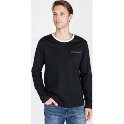 Calvin Klein Monogram Koszulka Czarny. Czarne podkoszulki męskie Calvin Klein, l, z nadrukiem, z bawełny, z długim rękawem. Za 216,95 zł.