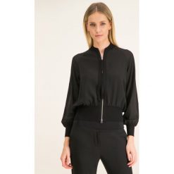 Bluza Marella Lipsia 31911001. Czarne bluzy damskie Marella, bez wzorów, z poliesteru, bez rękawów, bez kaptura. W wyprzedaży za 659,00 zł.