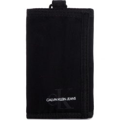 Duży Portfel Damski CALVIN KLEIN JEANS - Monogram Nylon Ns Wallet K60K605546 001. Czarne portfele damskie Calvin Klein Jeans, bez wzorów, z jeansu. W wyprzedaży za 109,00 zł.
