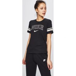 Nike - Top. Czarne topy damskie Nike, s, z nadrukiem, z bawełny, z okrągłym kołnierzem. Za 169,90 zł.