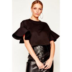 Bluzka Victoria Victoria Beckham Ruffed 2120JTP000545A. Białe bluzki damskie Victoria Victoria Beckham, s, bez wzorów, z bawełny, bez kołnierzyka, bez rękawów. W wyprzedaży za 669,00 zł.
