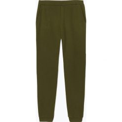 Spodnie dresowe "Kinibay" w kolorze ciemnozielonym. Zielone spodnie męskie American Vintage, xxl, bez wzorów, z bawełny. W wyprzedaży za 129,95 zł.