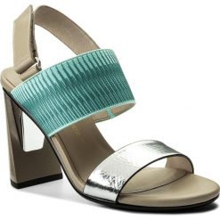 Sandały UNITED NUDE - Zink Slingback Hi 10300440108 Silver/Mint/Ivory. Brązowe klapki damskie marki United Nude, bez wzorów, ze skóry, bez obcasa, na obcasie. W wyprzedaży za 499,00 zł.