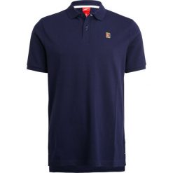 Nike Performance HERITAGE Koszulka polo obsidian/white. Niebieskie koszulki polo męskie Nike Performance, m, z bawełny. W wyprzedaży za 125,30 zł.