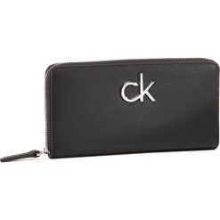 Duży Portfel Damski CALVIN KLEIN - Re-Lock Zip Around Lg K60K606807 BAX. Czarne portfele damskie Calvin Klein, bez wzorów, ze skóry ekologicznej. Za 359,00 zł.