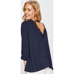 Vero Moda - Bluzka. Czarne bluzki damskie Vero Moda, na co dzień, s, bez wzorów, z elastanu, eleganckie, z okrągłym kołnierzem, bez rękawów. W wyprzedaży za 79,90 zł.