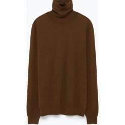 Wełniany sweter w kolorze brązowym. Pomarańczowe swetry męskie American Vintage, s, bez wzorów, z wełny, z golfem, bez kaptura. W wyprzedaży za 182,95 zł.