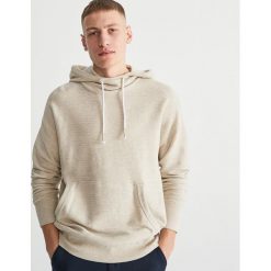 Bluza z bawełny organicznej - Biały. Białe bluzy męskie Reserved, s, bez wzorów, z bawełny, bez kołnierzyka, bez rękawów, bez kaptura. W wyprzedaży za 69,99 zł.