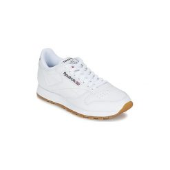 Buty Reebok Classic CLASSIC LEATHER. Białe trampki i tenisówki damskie marki Reebok Classic, bez wzorów, bez zapięcia. Za 399,00 zł.