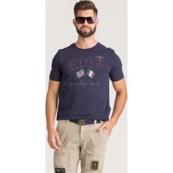 T-SHIRT Aeronautica Militare. Niebieskie t-shirty męskie Aeronautica Militare, s, z nadrukiem, z bawełny, z okrągłym kołnierzem. Za 209,00 zł.